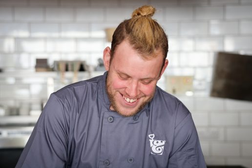 Portrait of Head Chef, Cameron in the kitchen